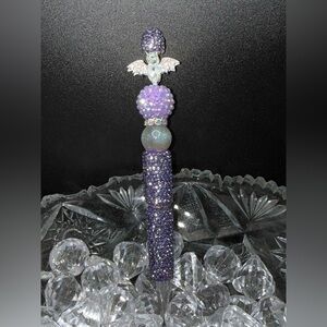 Bling pen homemade.  Purple with bat new.  And adorable